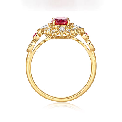 Elegant 18K gold ring featuring an oval-cut ruby with diamond halo and intricate cluster detailing.